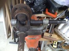 Replacing a front axle u-joint.