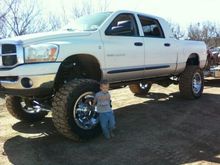 Brayden next to friends truck