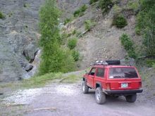 Portland Mine, it caved in long ago. The tracks come out about 30', and the ties continue to whats left of the ore chute