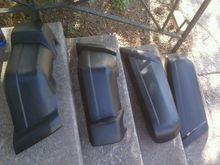 Removed, primed, and bedlinered bumper end caps.