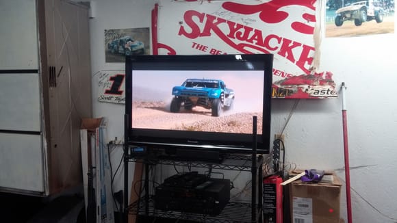 Setting up the necessities for a proper shop. Plasma & surround, check. The Mint 400 dvd, check.