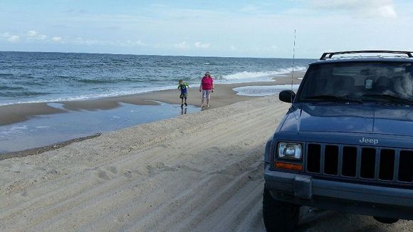 My beautiful wife and grandson checking out the beach.