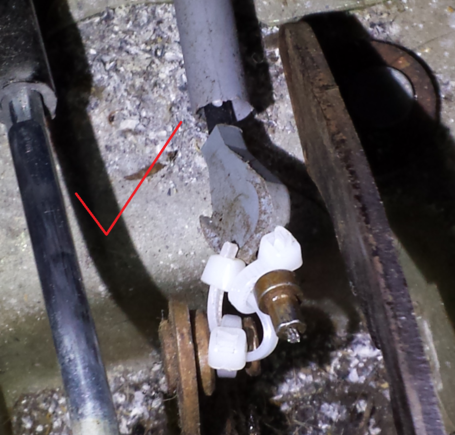 The little rig I came up with. Works like a charm. I also lubed up the pivoting mechanism while I was at it too. 

Been running with it like this for a while and I don't get any more bind ups.