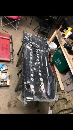 I opted for a 1/2 floor pan off Quadratec. I laid the pan in on top of the frame rail and traced the edges of the rails with a sharpie on the underside. This gave me an idea where to drill holes to be plug welded to the frame. 