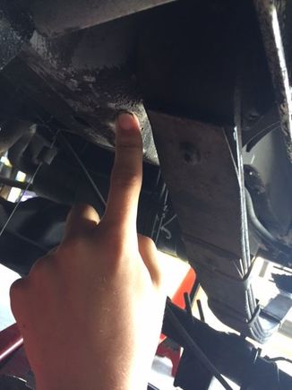 This is a poor picture but this is the pocket for the nut and I am pointing at where I drilled my pilot hole.