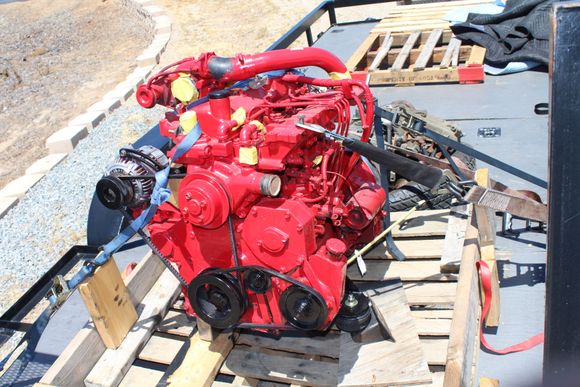 Engine is on the trailer.  Prepped with trans bolted on with a new clutch, pressure plate and throw out bearing.  Enroute to a friends shop that has a lift.  Additionally he has a few larger fabrication tools than I have at my home "shop"