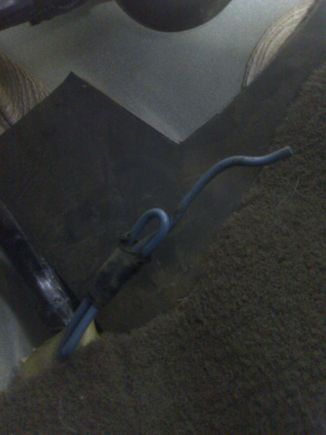 This is located under the steering wheel. If I recall correctly from when I parted out my 97 XJ, this wire is for towing?