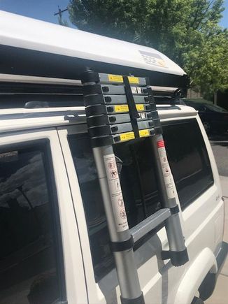 The ladder can be locked in this position or extended.