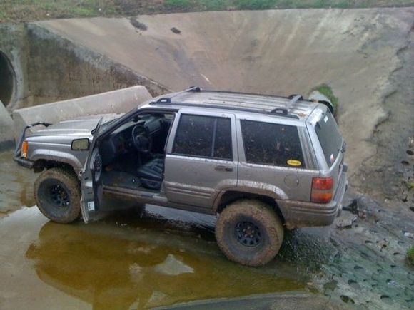 Jeep in Drainage Ditch
