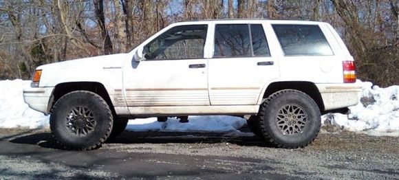 lifted 2&quot; front and rear and 31x10.5 Dunlop mud rovers.