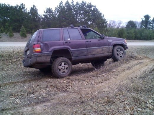 My bro-in-law Maxx doin a flex on one of the dirt bike jumps.