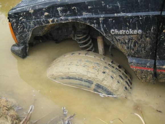 got stuck. dont stop in muddy water for a prolonged period of time or your wheel will sink in. whoops!