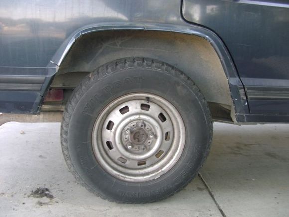 chooped the rear flares by making cuts and folding it back so the sheet metal wouldnt spread apart