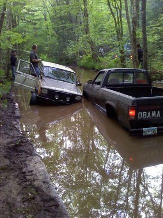 stuck in water for 3 hours and one flat tire/ and broken tow strap sent D ring through back window