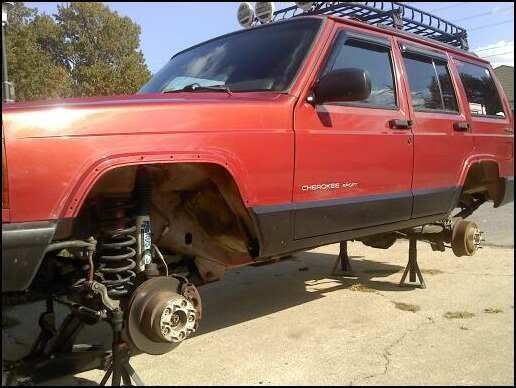 decided to trim the fenders and paint the lower quarter black