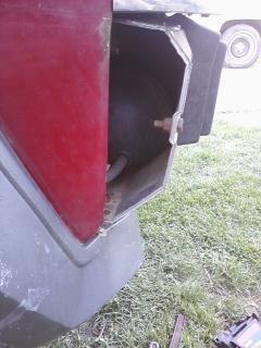 some type of black ball behind the bumper. i don't know what it is either.
