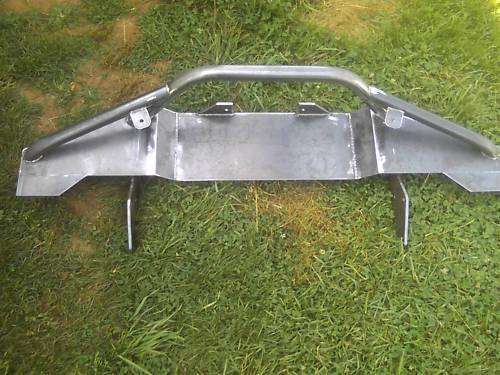 overhead pic of the Pro front bumper. (yes those are full length PLATE tie in brackets that bolt all the way being the steering box.)