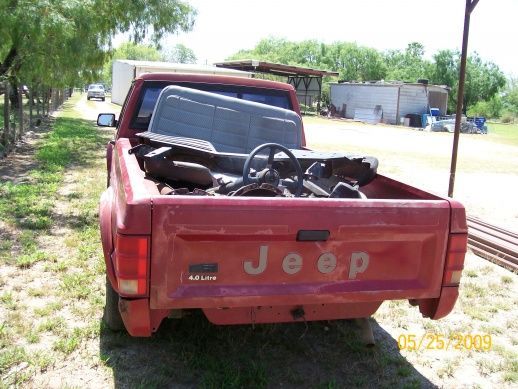 Rear view. The rear bumper is in the pickup bed along with many spares like 2 AW4s and a couple of Renix era transfercases plus a tilt column for it.