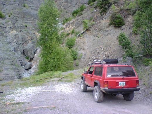 Portland Mine, it caved in long ago. The tracks come out about 30', and the ties continue to whats left of the ore chute