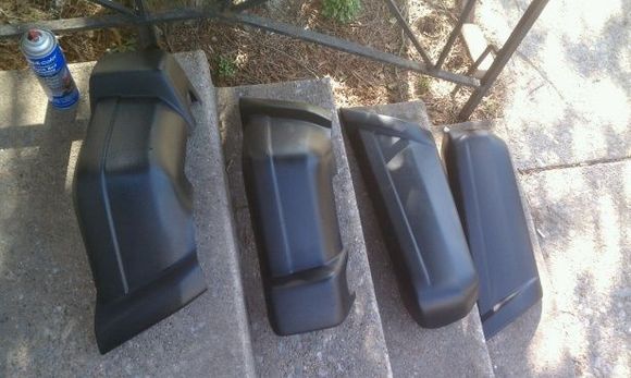 Removed, primed, and bedlinered bumper end caps.