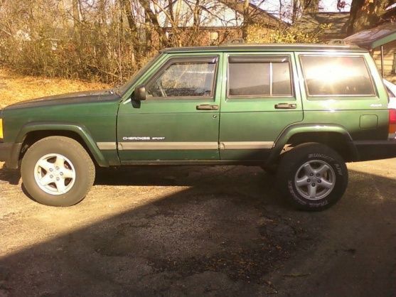 My Jeep with the rear end lifted.