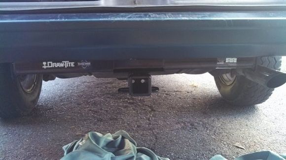 New hitch. I like fishing, but not the kind that involves fishing steel plates and bolts through little holes in the back of the Cherokee's frame.