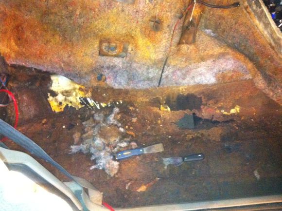 Soaked Backing and Exhaust heat left a rotted mess