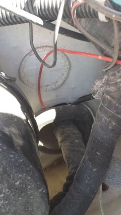 Electric leading through firewall on left (red) coax on right.