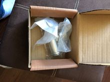 It came packed in a plastic bag inside a cardboard box 