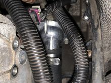 The 2007 housing from Dorman, no cap to crack and leak. 