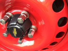 The lug nut caps friction fit to hold the caps in place. 