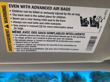 Sun visor air bag label drivers side