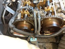 This is proof the chain is in need of replacement, see the top guide between the camshaft actuators , see the top of the guide se broken away? Caused by a loose chain