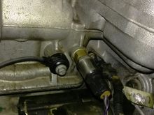 That’s it with the wires connected to it on through the , that’s the starter just below it, and the knock sensor to the right.