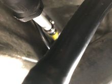 The fuel line to the tank has a female  quick connect fitting 
It appears in your photo that piece is missing where the gear clamp is. Dorman has those available to replace that 3/8 connection 