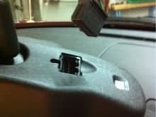 Connector on rear view. Mirror has single screw to remove. Nice.
