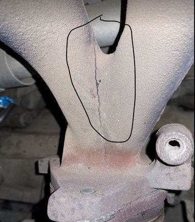 You will have to remove the heat shield 