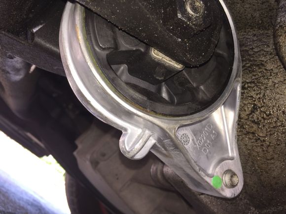 These two bolts at the bottom of the front mount, easy access