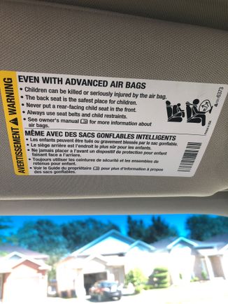 Sun visor air bag label drivers side