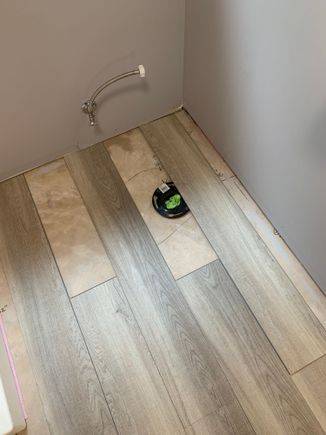 Checking the flooring to see which way will work better 