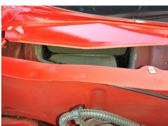 This is a 2010, but the same as 07 thru 11 model years, note the difference in the shape of the holes.
There is a drain hole in there, pull the wiper cowl cover and check it 