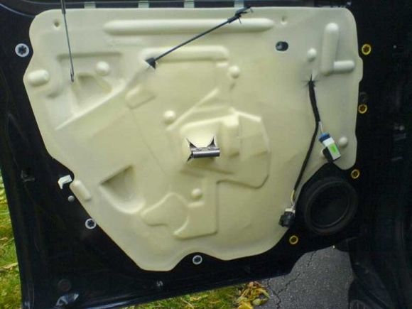 A foam plastic panel like this, held in place by black butyl adhesive 