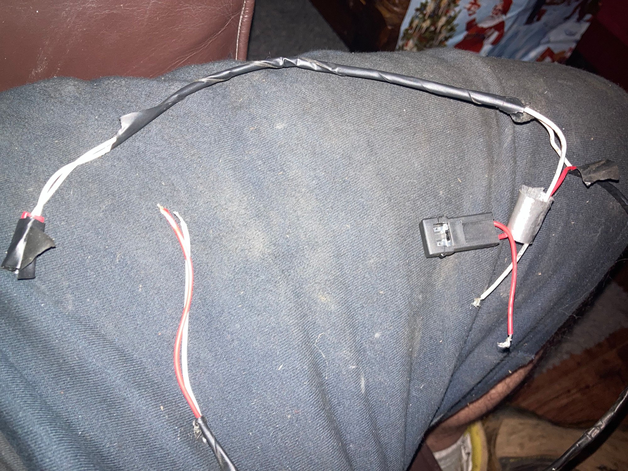 image of wiring which was loose in car having been ripped out, so no idea where this goes 