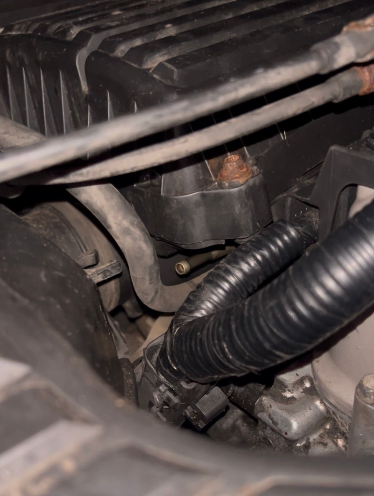 There�s a line there underneath the air filter I need to know where this goes to and what kind of hose I need to get because I think the hose is missing.