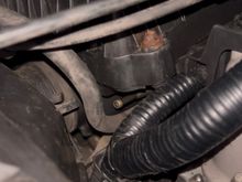 There’s a line there underneath the air filter I need to know where this goes to and what kind of hose I need to get because I think the hose is missing.