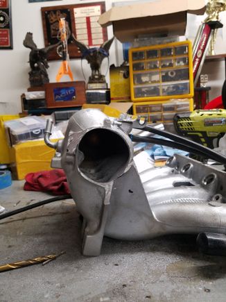 Cut the flange and bored out the intake hole