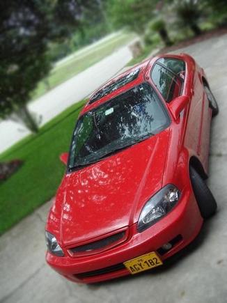 This is one of the first pictures I have of it when i drove it off the lot. It was BONE stock still had factory head unit and everything. First thing I got were headlight since the factory units were all hazy and nasty. Drop in filter, neuspeed springs and HOP fog lights (someone stole the garnsihes trying to steal the light)