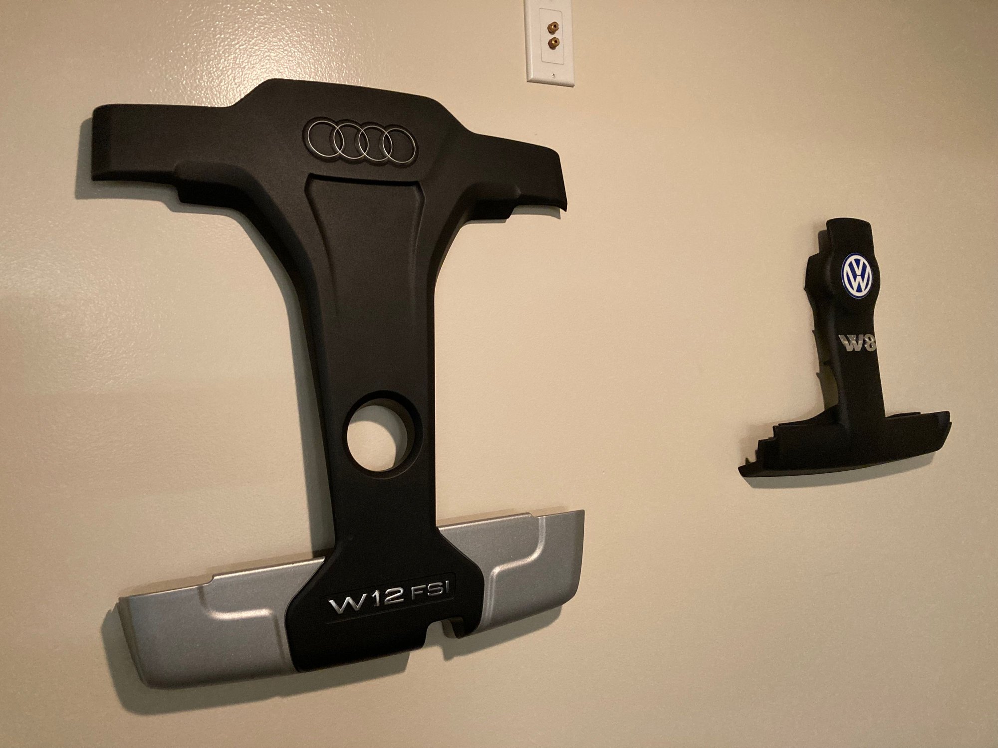 Spares are hung up downstairs, next time my exotic car friend come down from Michigan we are going to take some night rolling shots of the D4 and some interior shots to frame one of each in the voids of the cover. W8 cover was thrown on the wall as well but I'm not sure how to integrate pictures for that car   