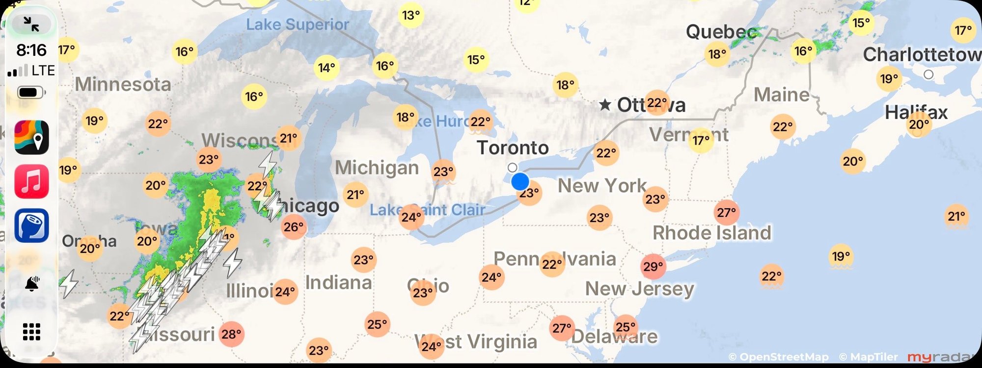 Cloud cover, lightning and temperature layers selected.