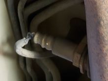 My right/passenger-side O2 sensor.  Clearly no shield/sink.  (sorry for focus)